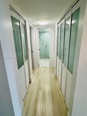 a view of a bathroom with shower