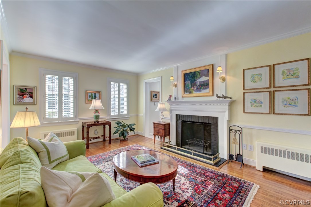 7716 Brookside Road Richmond, VA 23229 - Photo 5 of 27 Light-filled living room with crown moulding, chai