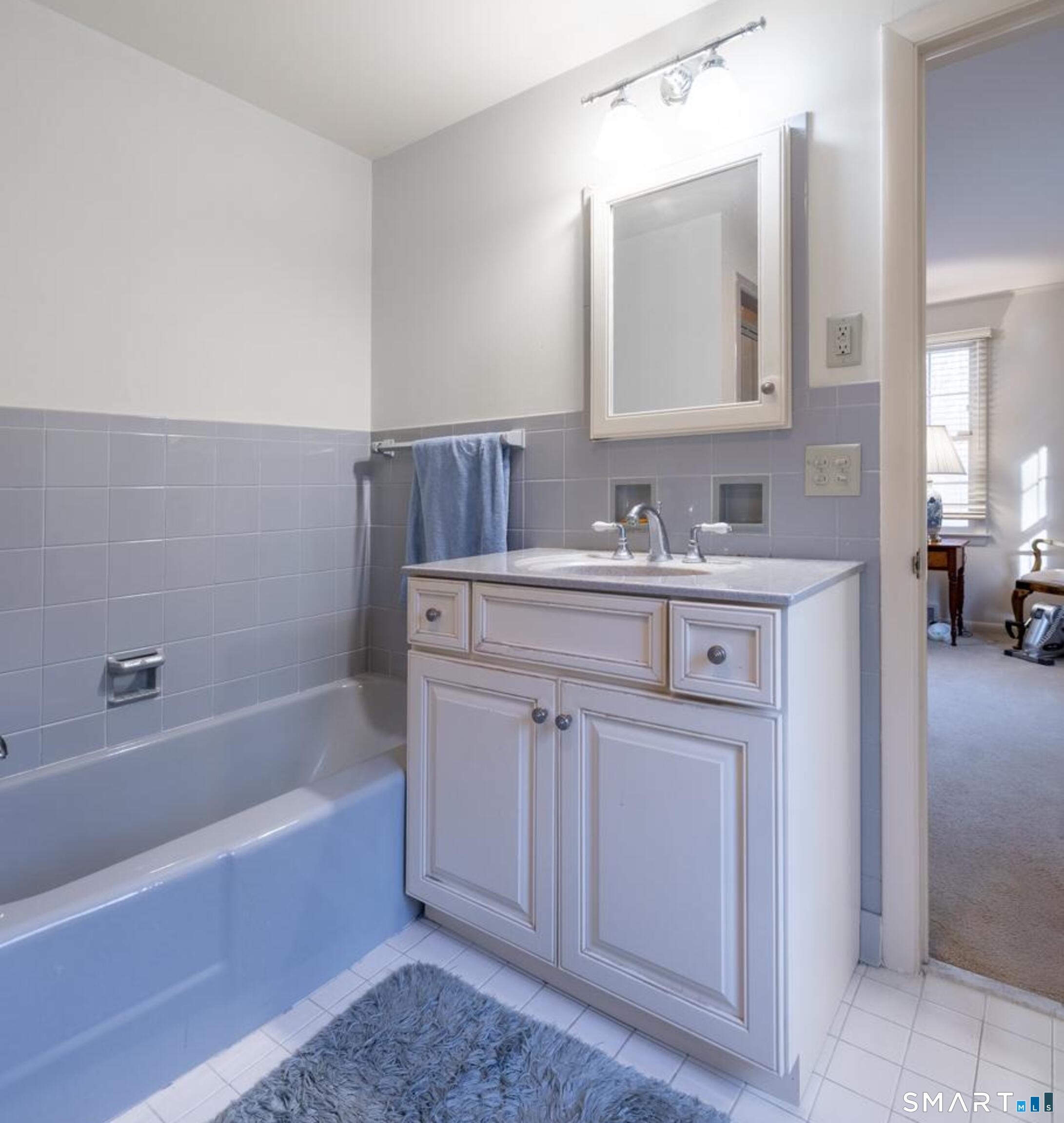 117 Crest Road Middlebury, CT 06762 - Photo 6 of 38 Well appointed bathroom with a walk-in shower and a tub too opens to both the office and the primary bedroom.