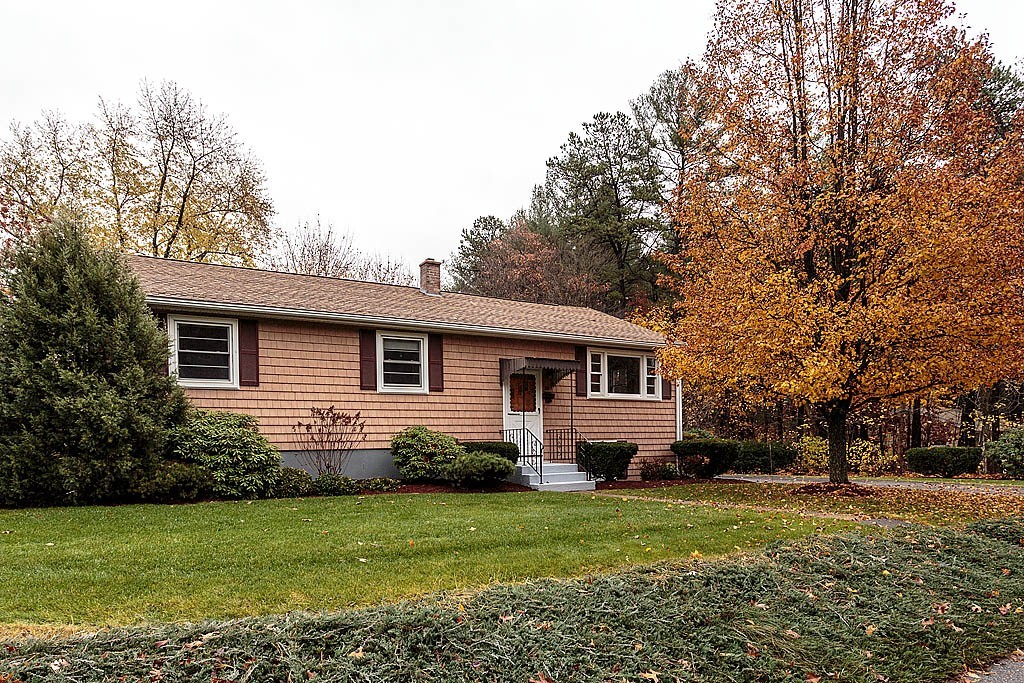 20 South Rhoda Street Tewksbury, MA 01876 - Photo 1 of 24 a front view of house with yard and trees
