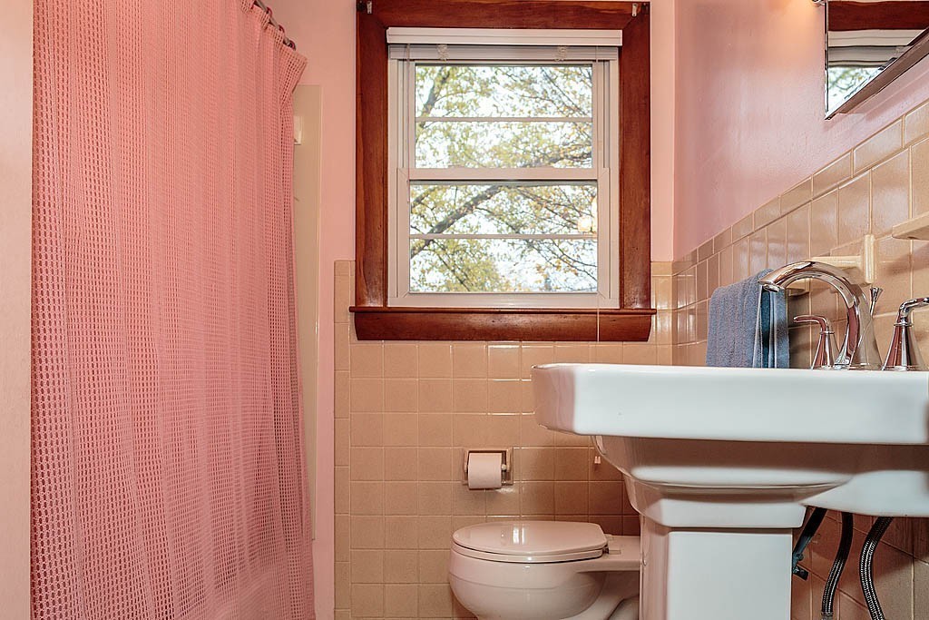 20 South Rhoda Street Tewksbury, MA 01876 - Photo 18 of 24 a bathroom with a toilet and a sink