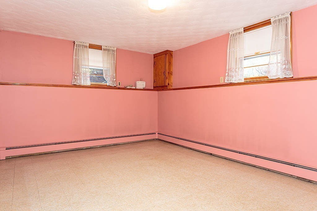 20 South Rhoda Street Tewksbury, MA 01876 - Photo 20 of 24 a view of a room with wooden floor