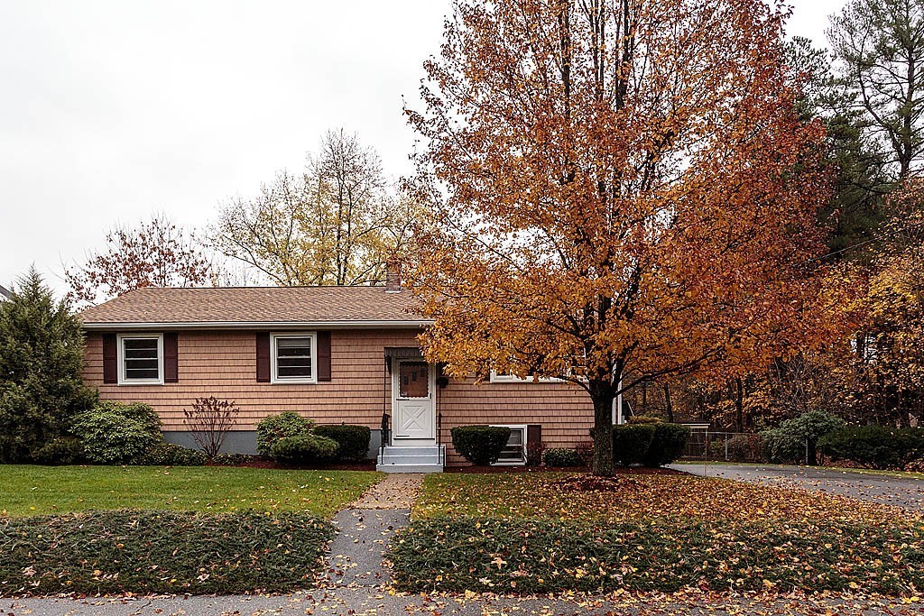 20 South Rhoda Street Tewksbury, MA 01876 - Photo 2 of 24 a view of a house with a yard