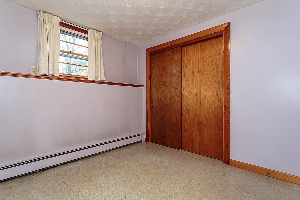 20 South Rhoda Street Tewksbury, MA 01876 - Photo 21 of 24 an empty room with windows