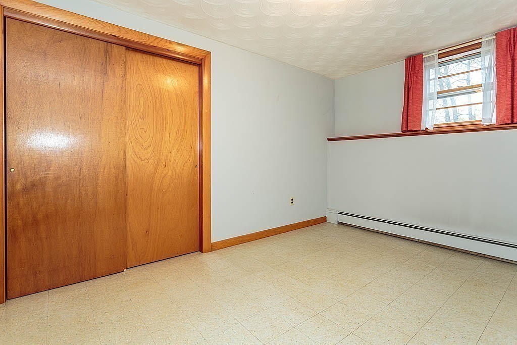 20 South Rhoda Street Tewksbury, MA 01876 - Photo 22 of 24 an empty room with windows and closet