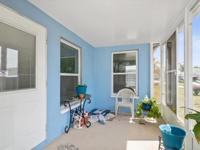 a room with furniture and a window