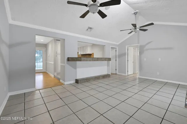 a view of an empty room and window