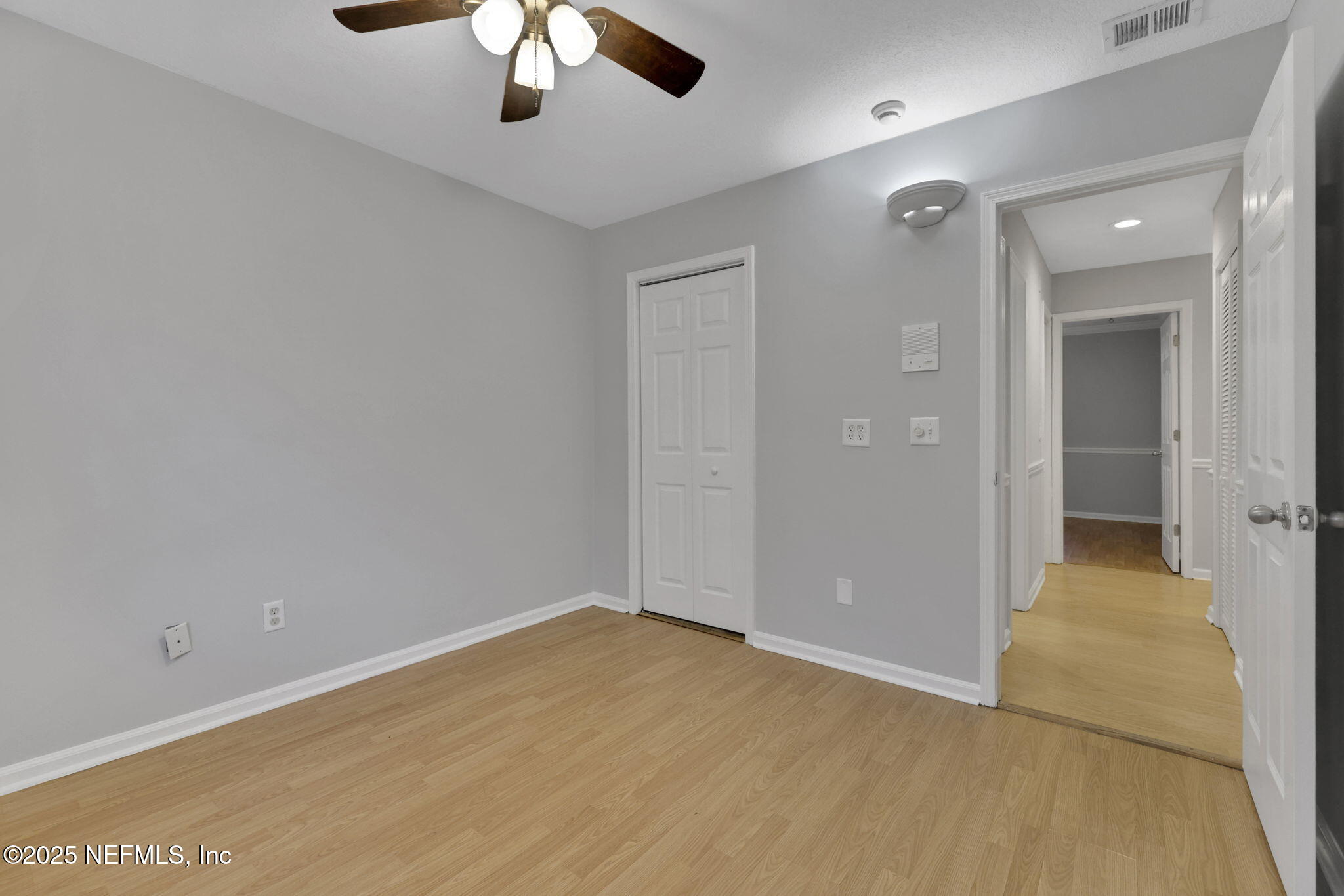 3452 North Ride Court Jacksonville, FL 32223 - Photo 23 of 39 wooden floor in an empty room