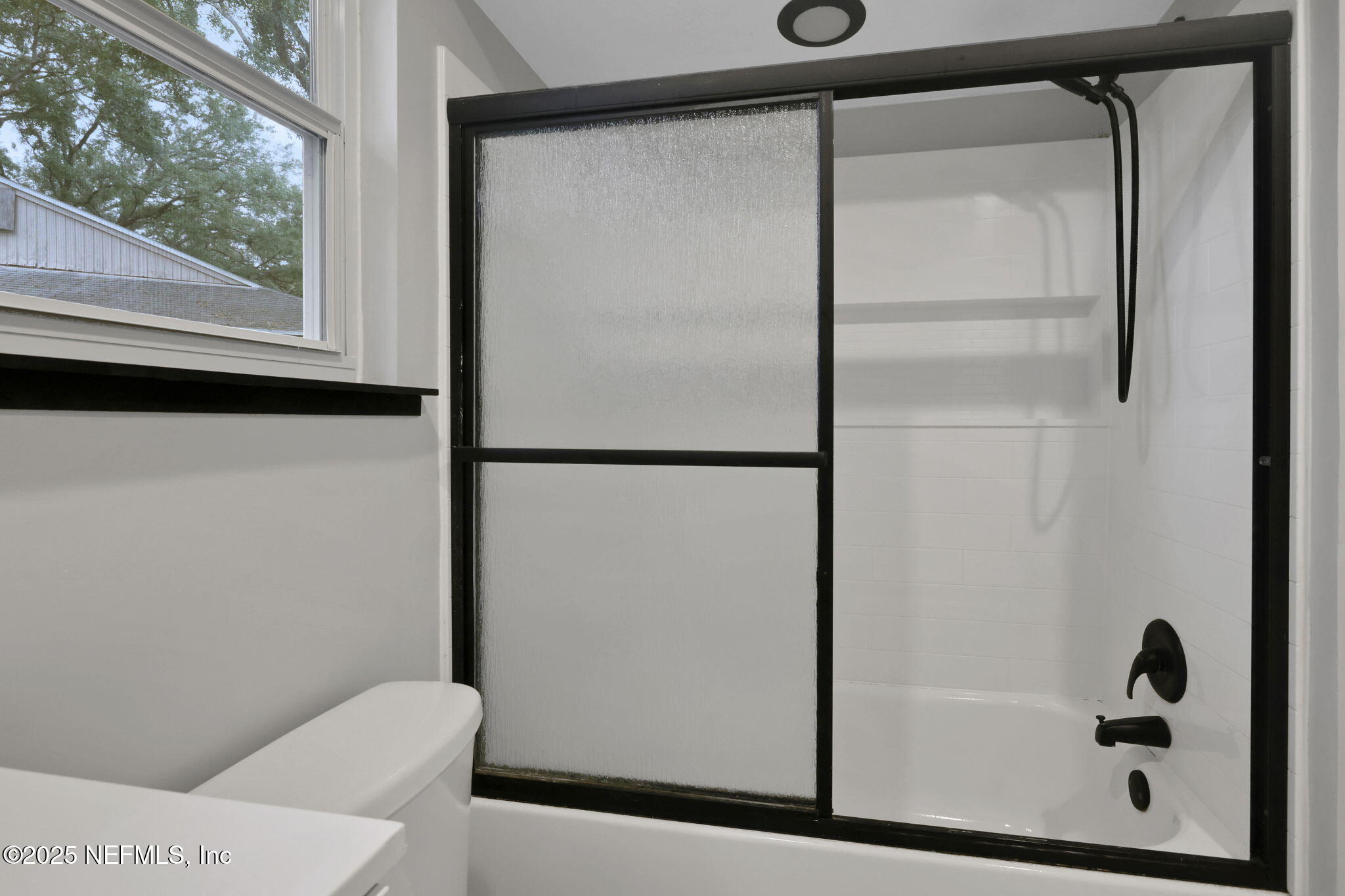 3452 North Ride Court Jacksonville, FL 32223 - Photo 25 of 39 a bathroom with a shower