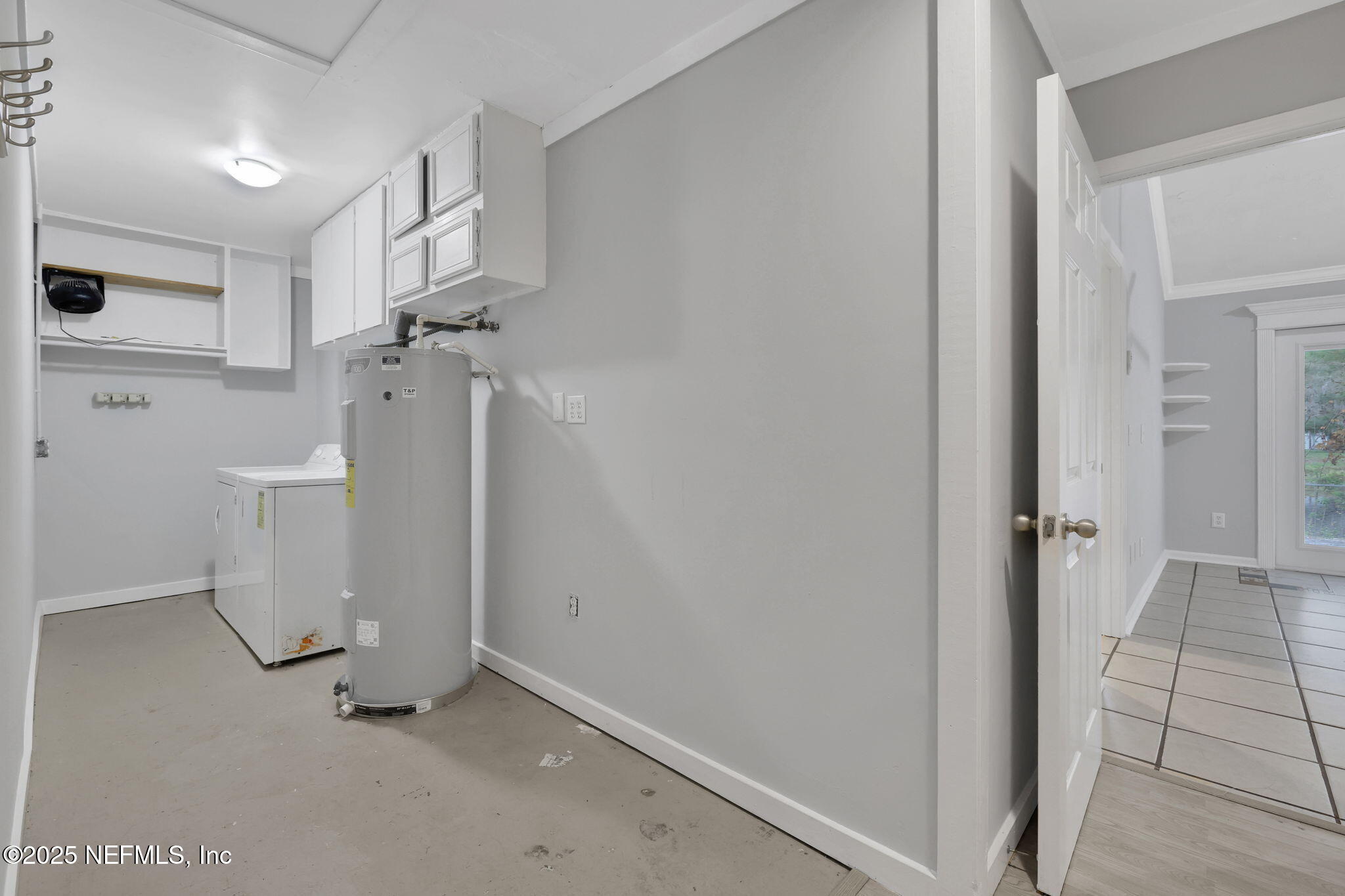 3452 North Ride Court Jacksonville, FL 32223 - Photo 35 of 39 a view of a storage & utility room with a washer dryer