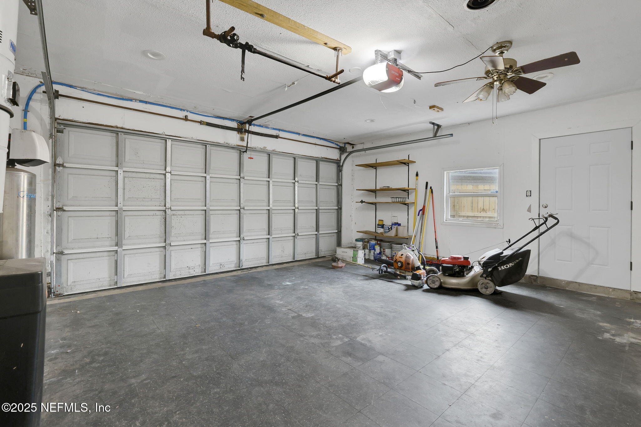 3452 North Ride Court Jacksonville, FL 32223 - Photo 38 of 39 a view of a room with gym equipment