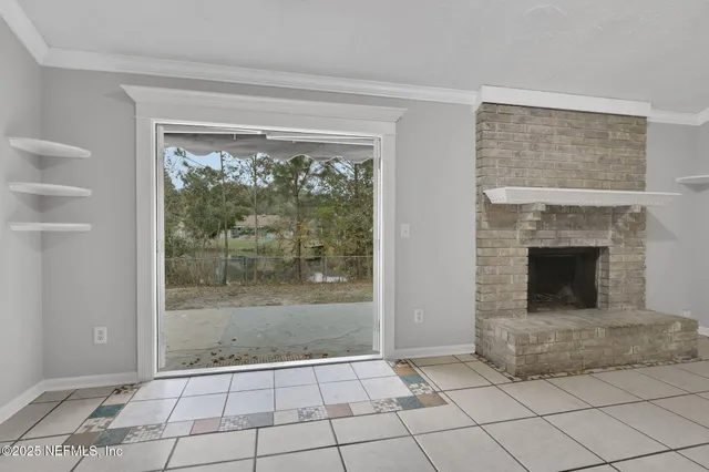 a view of a kitchen with a sink and cabinets