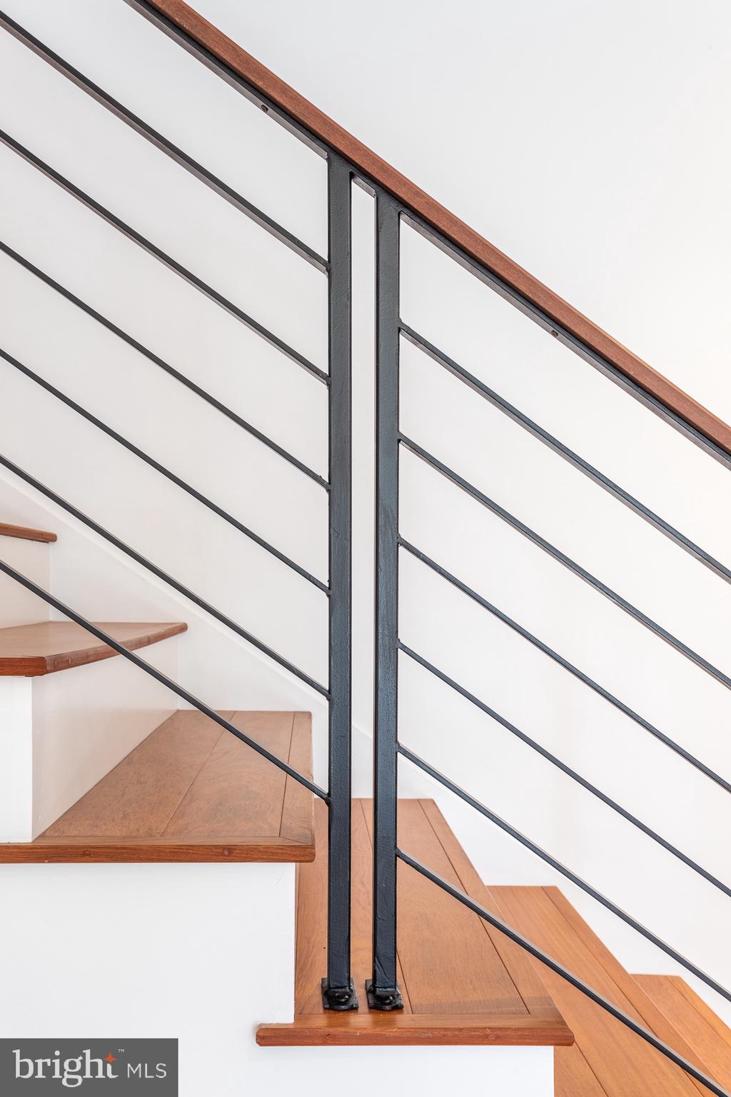 34 Ritchie Avenue Silver Spring, MD 20912 - Photo 18 of 72 Sleek handrails heading upstairs.