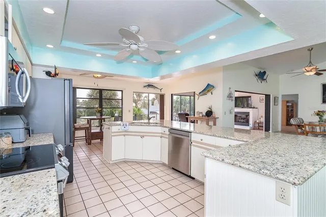 a dining room with furniture window and wooden floor