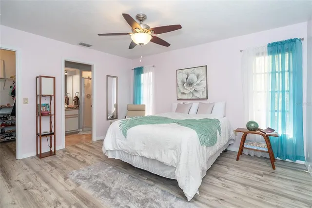 a bathroom with a sink double vanity and a mirror