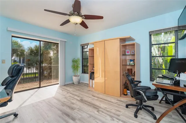 a view of an empty room with a fireplace