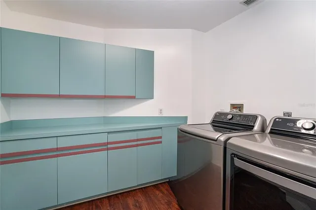 a bathroom with a sink toilet and mirror