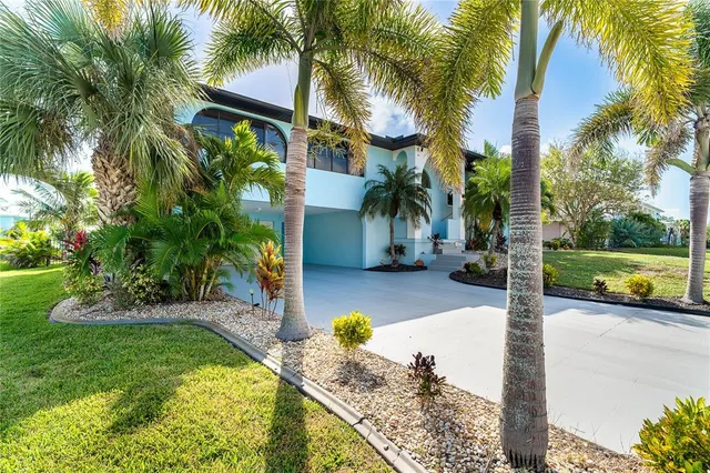 a swimming pool view with a garden