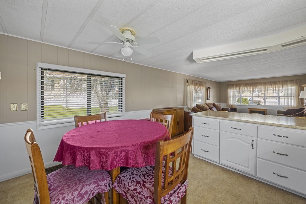 102 Peter Street Raynham, MA 02767 - Photo 11 of 23 a view of a dining room with furniture and window