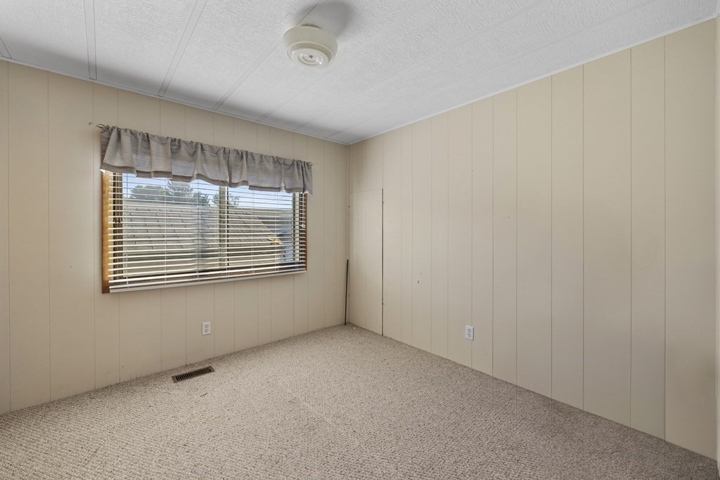 102 Peter Street Raynham, MA 02767 - Photo 12 of 23 a view of an empty room with a window