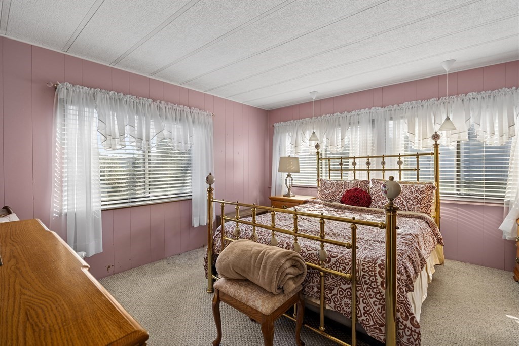 102 Peter Street Raynham, MA 02767 - Photo 15 of 23 a living room with furniture and windows