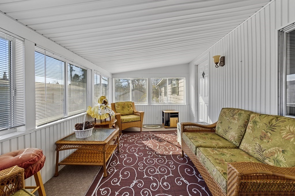 102 Peter Street Raynham, MA 02767 - Photo 17 of 23 a living room with furniture and a large window
