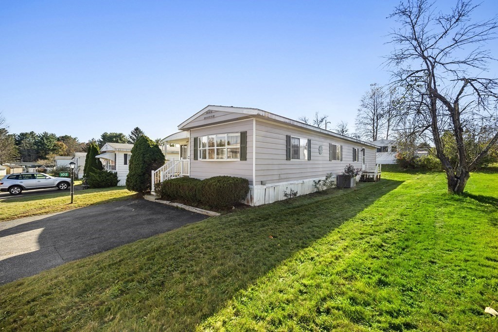 102 Peter Street Raynham, MA 02767 - Photo 20 of 23 a view of an house with backyard and garden