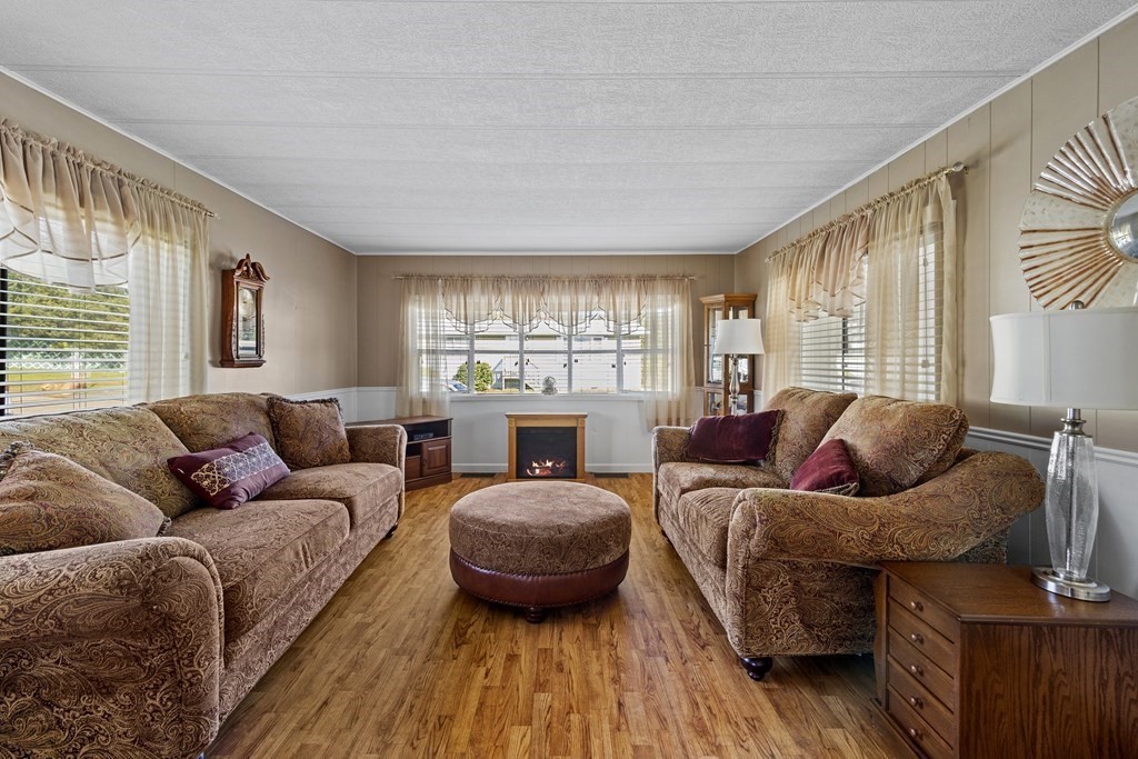 102 Peter Street Raynham, MA 02767 - Photo 3 of 23 a living room with furniture and a large window