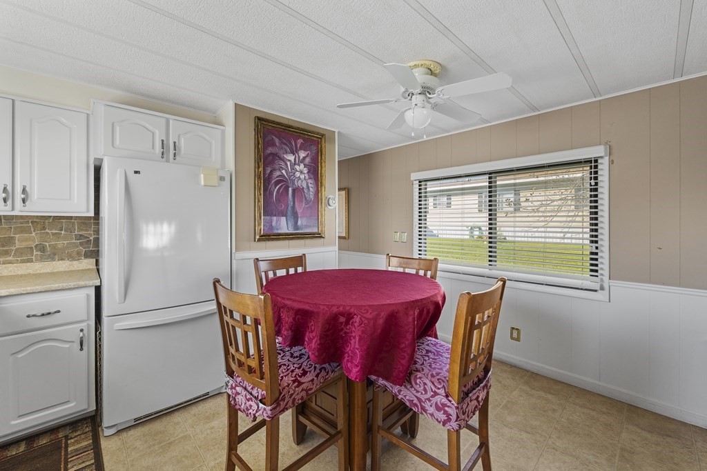 102 Peter Street Raynham, MA 02767 - Photo 10 of 23 a view of a dining room with furniture window and wooden floor