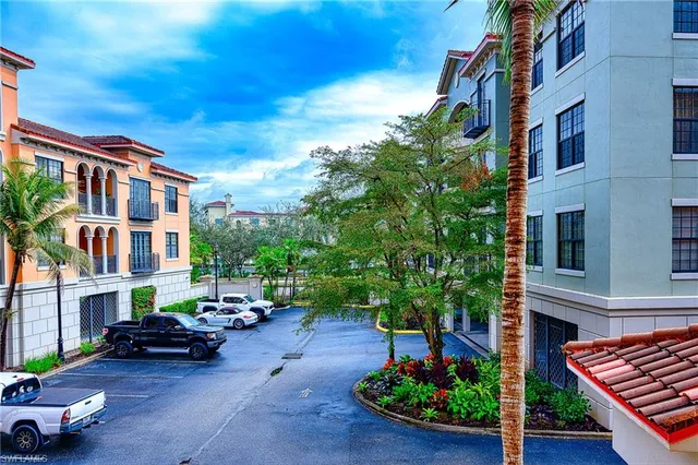 a front view of a house with sitting area