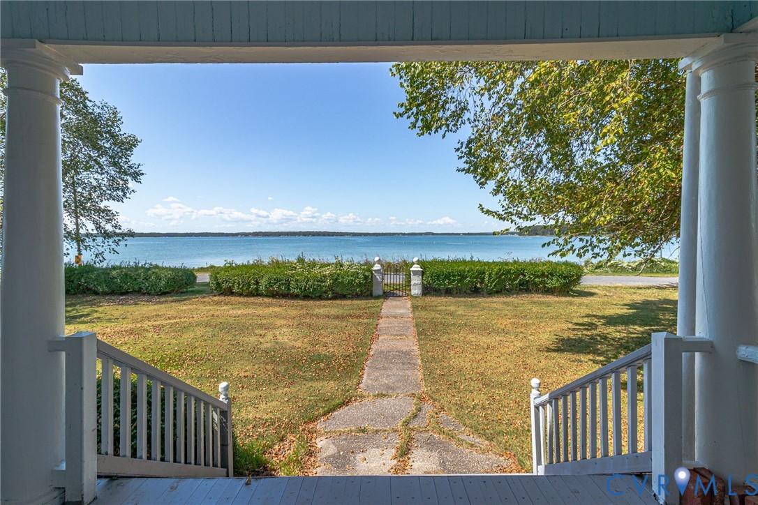 218 Fleeton Point Circle Reedville, VA 22539 - Photo 15 of 43 View of green lawn featuring a water view