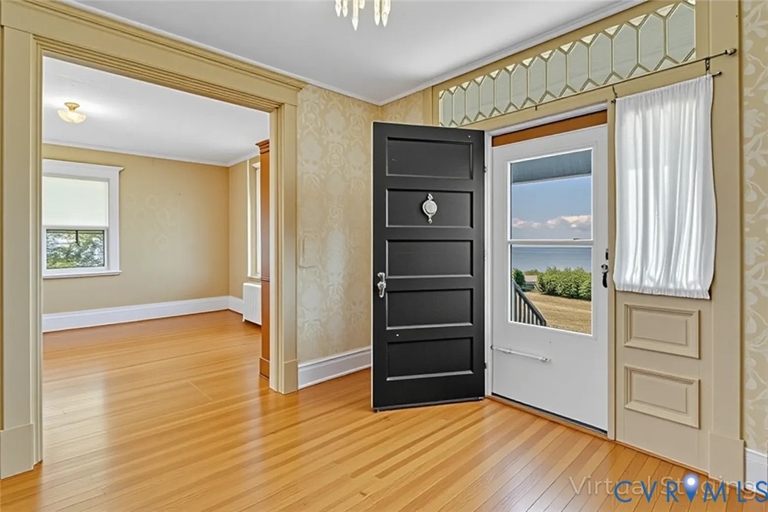 218 Fleeton Point Circle Reedville, VA 22539 - Photo 17 of 43 Foyer featuring light wood-style flooring, wallpap