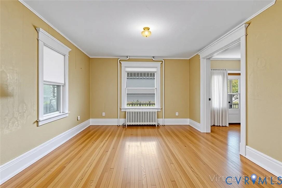 218 Fleeton Point Circle Reedville, VA 22539 - Photo 18 of 43 Unfurnished room with light wood finished floors,
