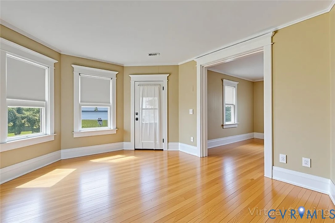 218 Fleeton Point Circle Reedville, VA 22539 - Photo 20 of 43 Unfurnished room with light wood-style floors and