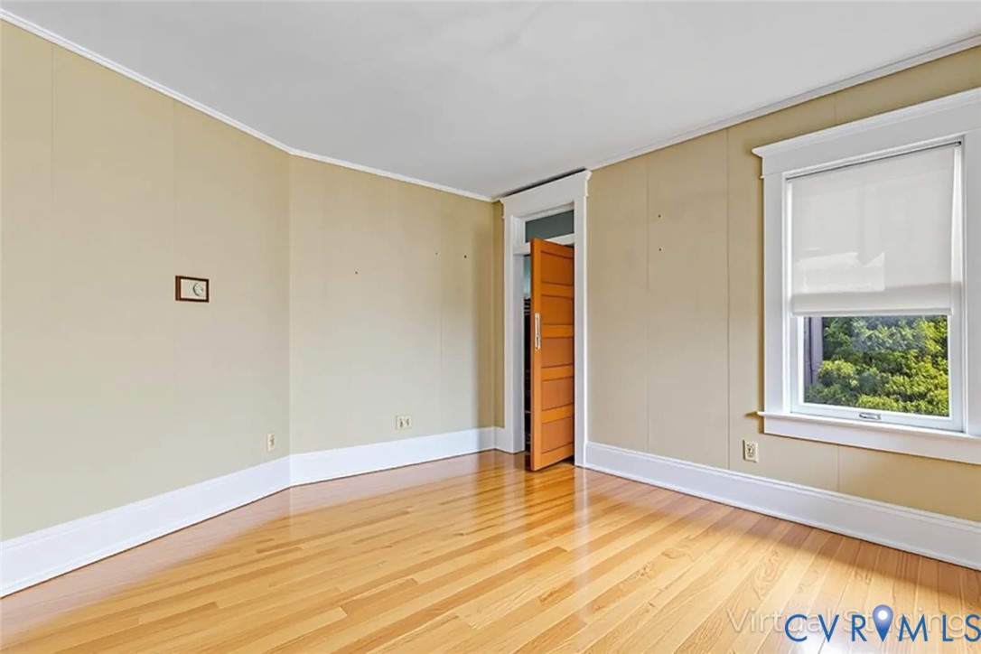 218 Fleeton Point Circle Reedville, VA 22539 - Photo 21 of 43 Spare room with light wood-type flooring and baseb