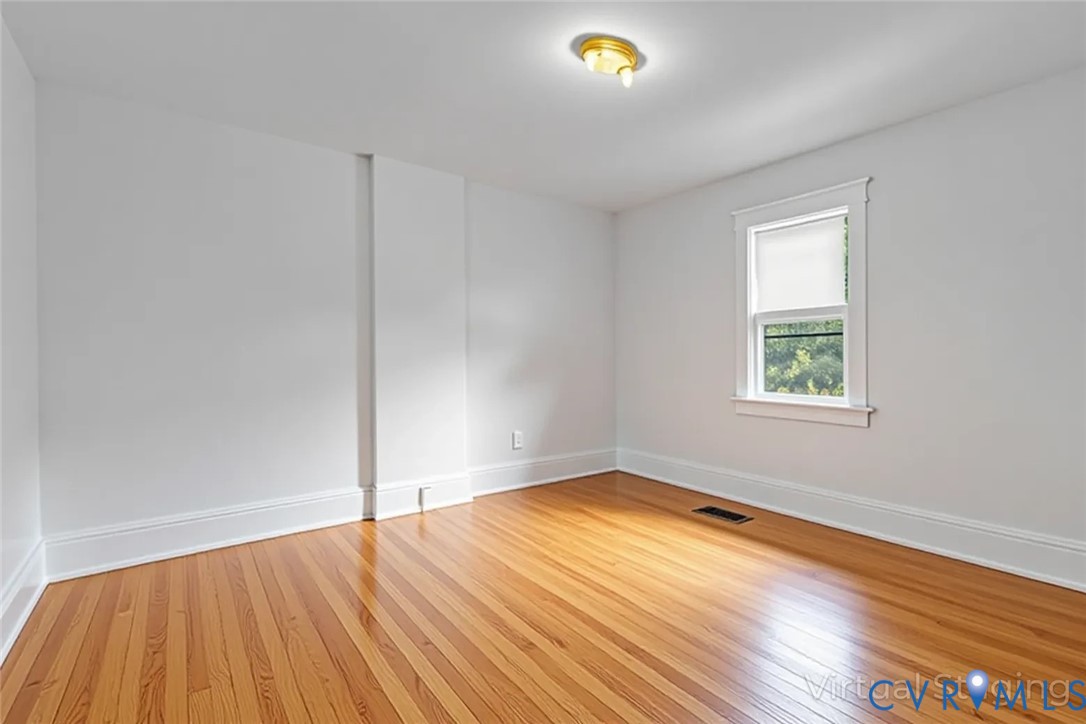 218 Fleeton Point Circle Reedville, VA 22539 - Photo 36 of 43 Unfurnished room featuring light wood finished flo
