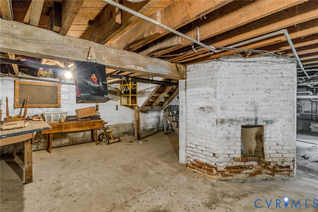 218 Fleeton Point Circle Reedville, VA 22539 - Photo 38 of 43 Unfinished basement with stairs