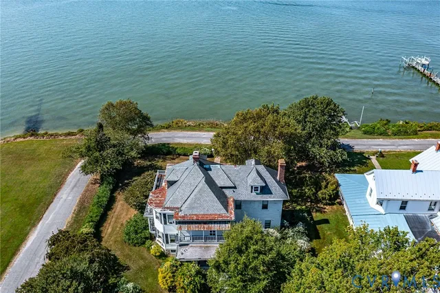an aerial view of houses with outdoor space