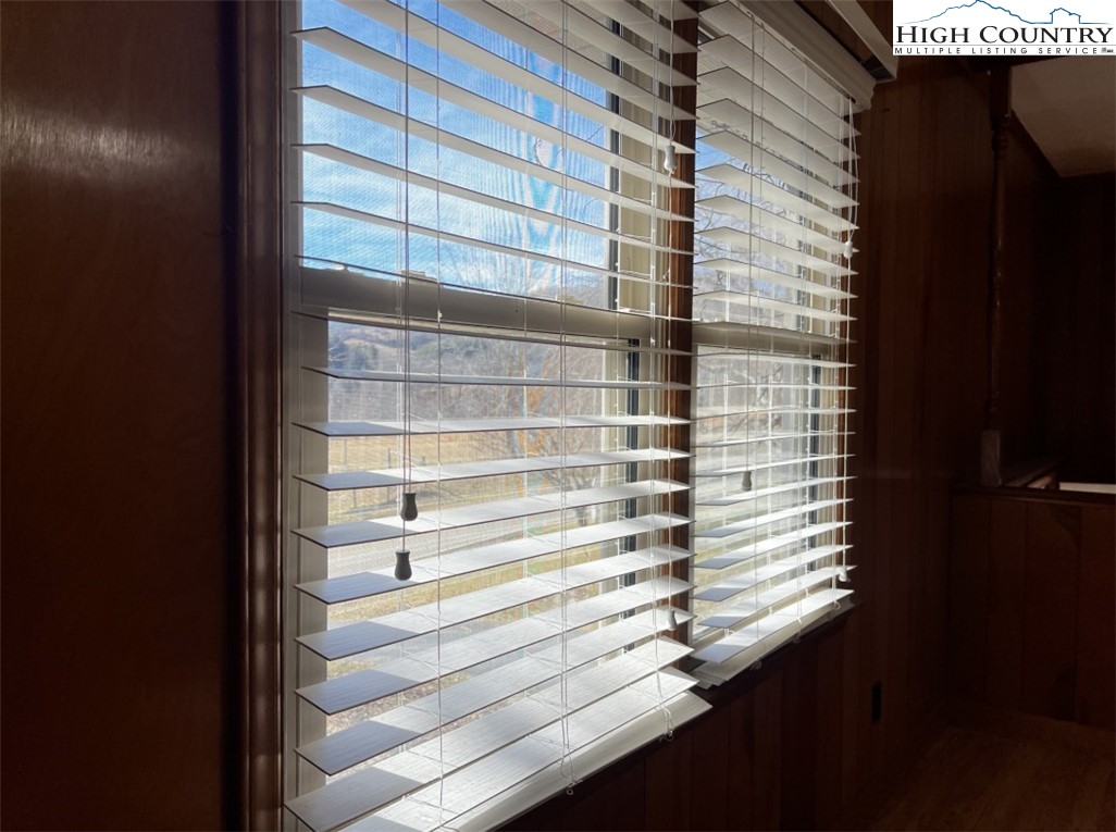 610 Collins Road Sparta, NC 28675 - Photo 13 of 22 a view of entry way with wooden door