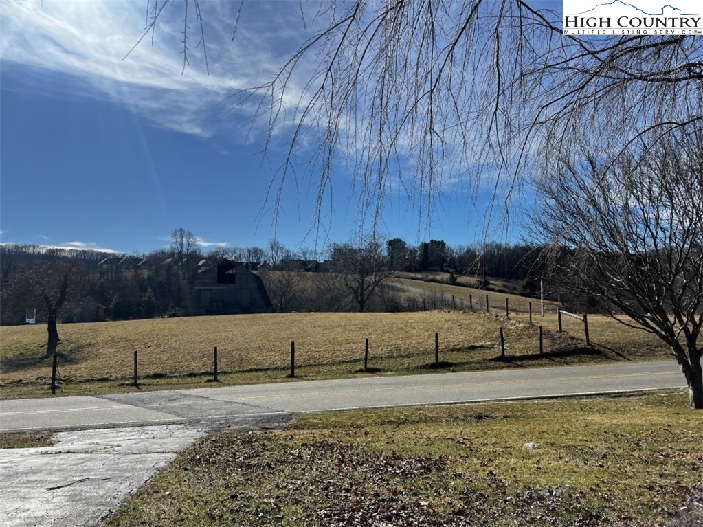 610 Collins Road Sparta, NC 28675 - Photo 20 of 22 a view of a yard