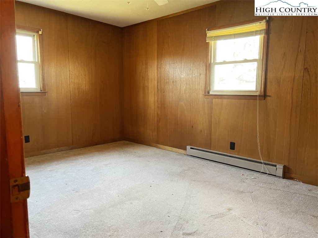 610 Collins Road Sparta, NC 28675 - Photo 22 of 22 an empty room with windows