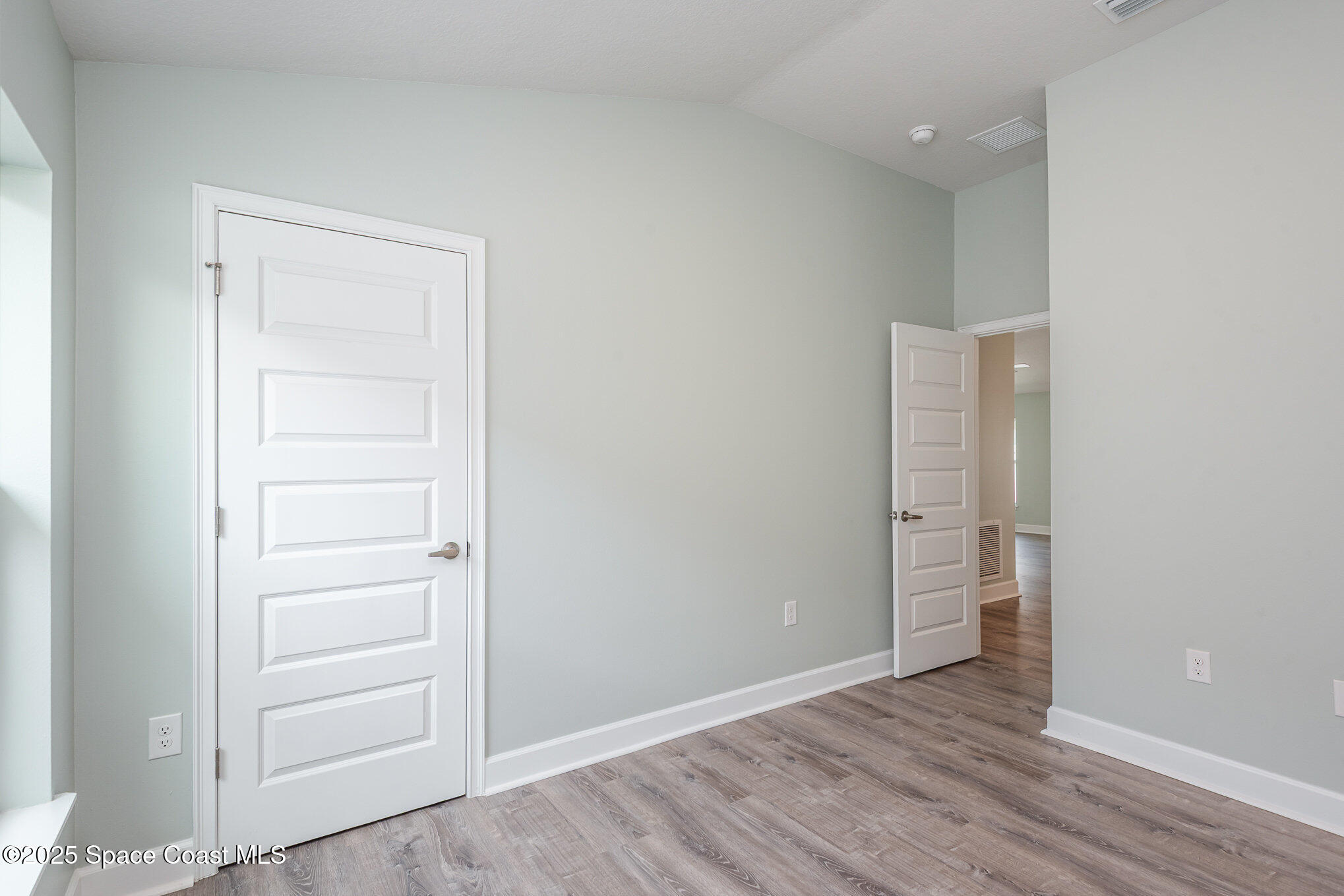 1331 Tupelo Circle Cocoa, FL 32926 - Photo 18 of 29 wooden floor in an empty room