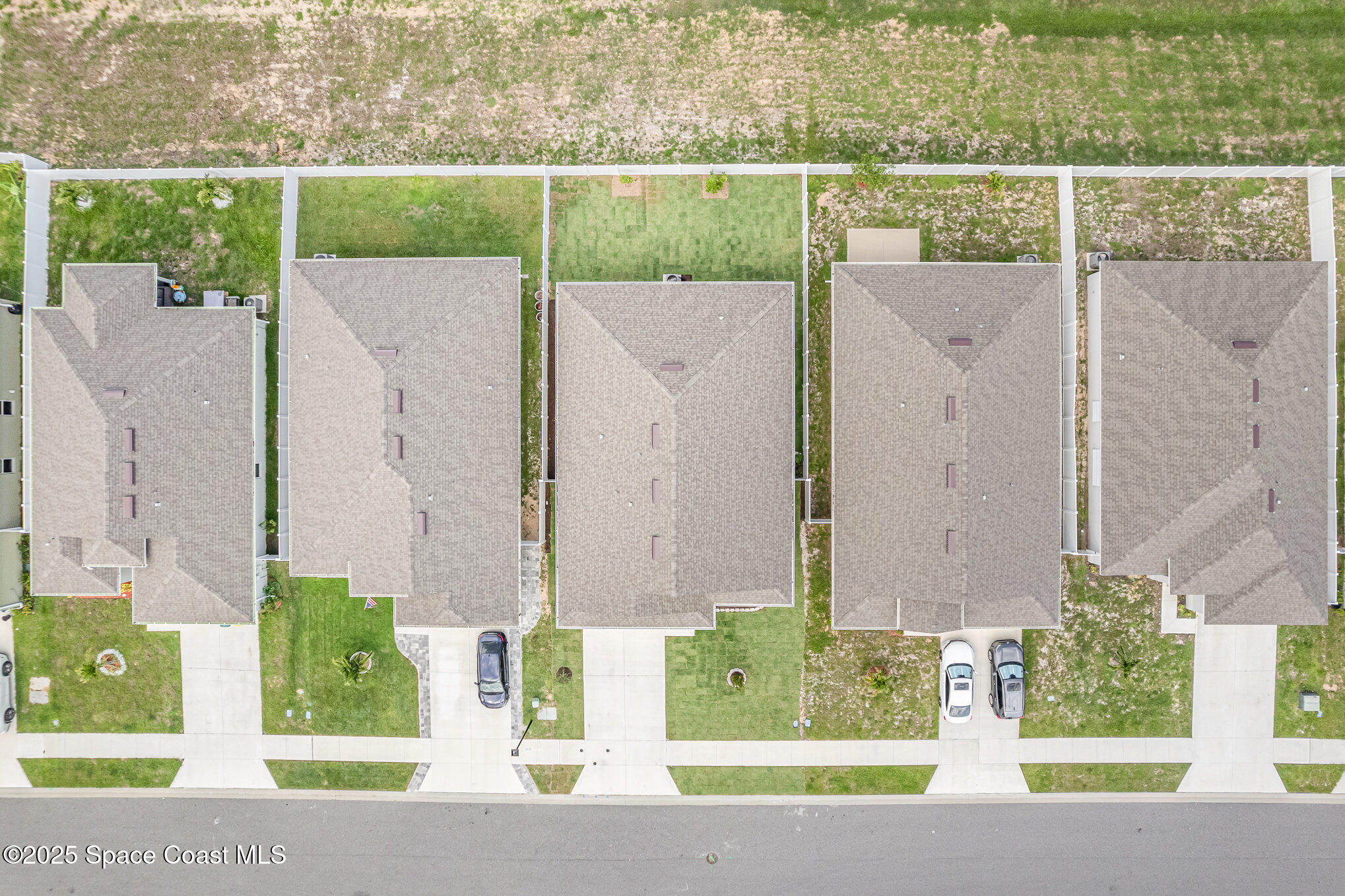 1331 Tupelo Circle Cocoa, FL 32926 - Photo 24 of 29 an aerial view of a house having outdoor space