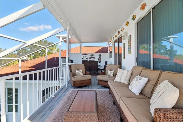 a bathroom with a granite countertop sink mirror and toilet