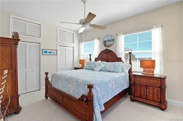 an aerial view of a house with yard swimming pool and outdoor seating
