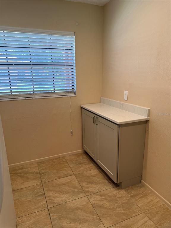 13250 Ridge Road, Unit 16 Largo, FL 33778 - Photo 11 of 36 a room with a sink