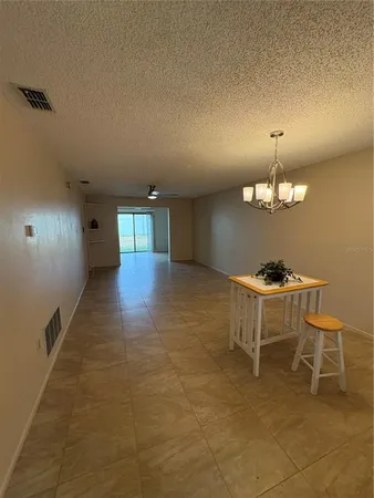 a view of a livingroom with a furniture