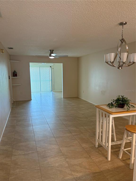 13250 Ridge Road, Unit 16 Largo, FL 33778 - Photo 12 of 36 a view of a livingroom with furniture wooden floor and a sink