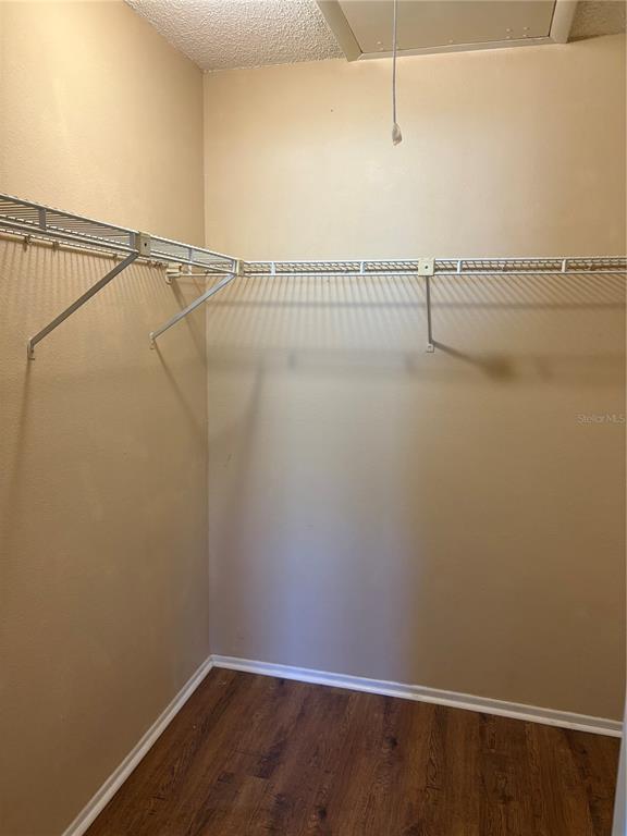 13250 Ridge Road, Unit 16 Largo, FL 33778 - Photo 18 of 36 a view of a room with racks on the wall