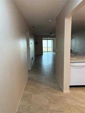 a view of a hallway with entryway